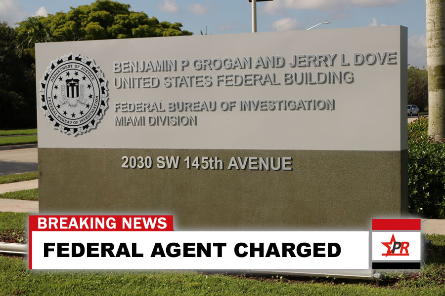 FEDERAL AGENT CHARGED