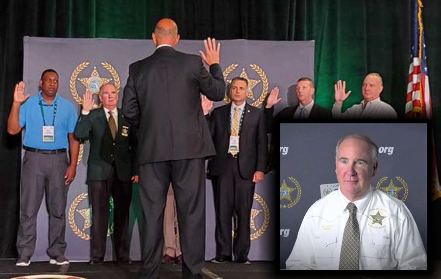 Sheriff Staly (right) being sworn in as an FSA Director. Photo Flagler County Sheriff's Office.