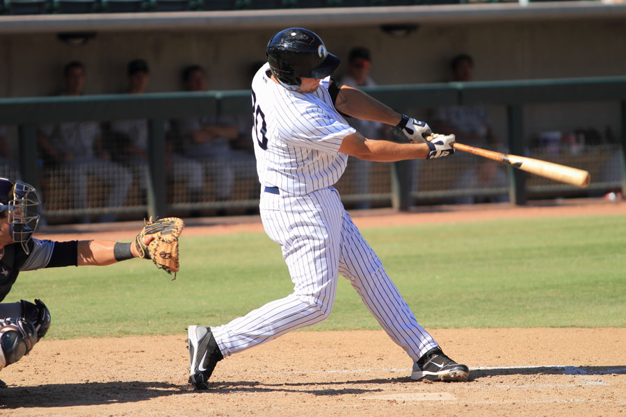 Rob Segedin, a High-A New York Yankees prospect, bats for the Phoenix Desert Dogs in an Arizona Fall League game Oct. 19, 2011 at Phoenix Municipal Stadium, Phoenix, AZ. Photo credit: Bill Florence / Shutterstock.com, licensed.