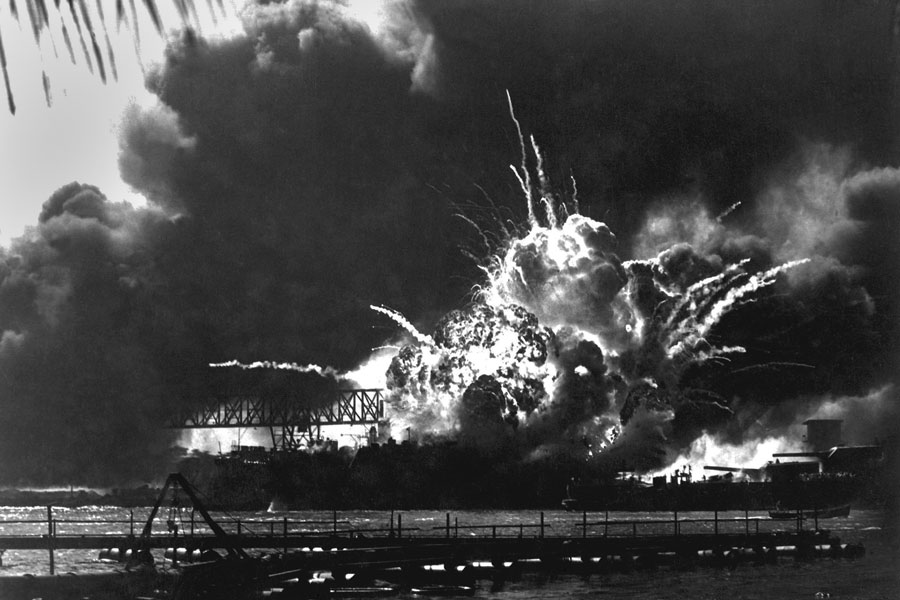 Explosion of the USS Shaw's forward magazine during the Japanese attack on Pearl Harbor, Dec. 7, 1941. The Shaw was repaired and served in the Pacific through World War II. Photo credit ShutterStock.com, licensed.