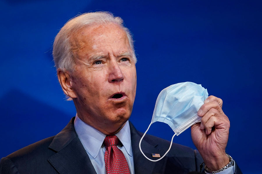 Then democratic president-elect Joe Biden holds up a face mask while giving remarks about the Affordable Care Act and Covid-19 at the Queen theater,in Wilmington. 11/09/2020 - Editorial credit: Stratos Brilakis / Shutterstock.com, licensed.