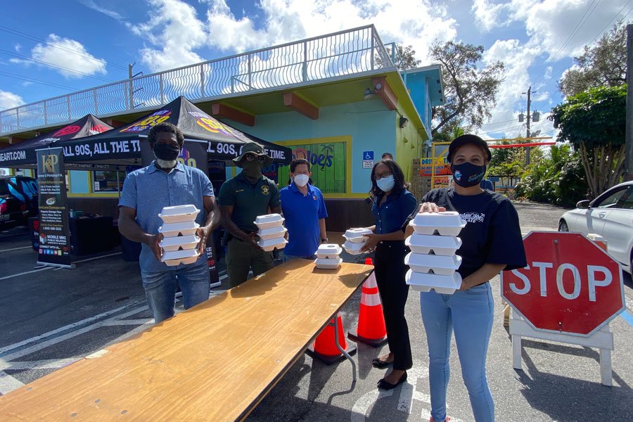 Among the volunteers were Dania Beach Broward Sheriff’s Office deputies and employees who served and distributed the meals in a drive-thru pick up at Island Joe’s. 