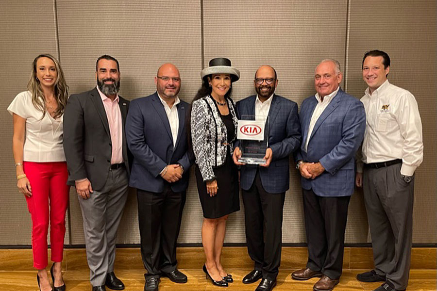 Raquel Case, Daniel Valdes (Kia), Jimy Contreras (Rick Case Kia GM), Rita Case, President and CEO, Rick Case Automotive Group, Percy Vaughn (Kia), Leroy Larson (Rick Case Executive GM), Ryan Case.