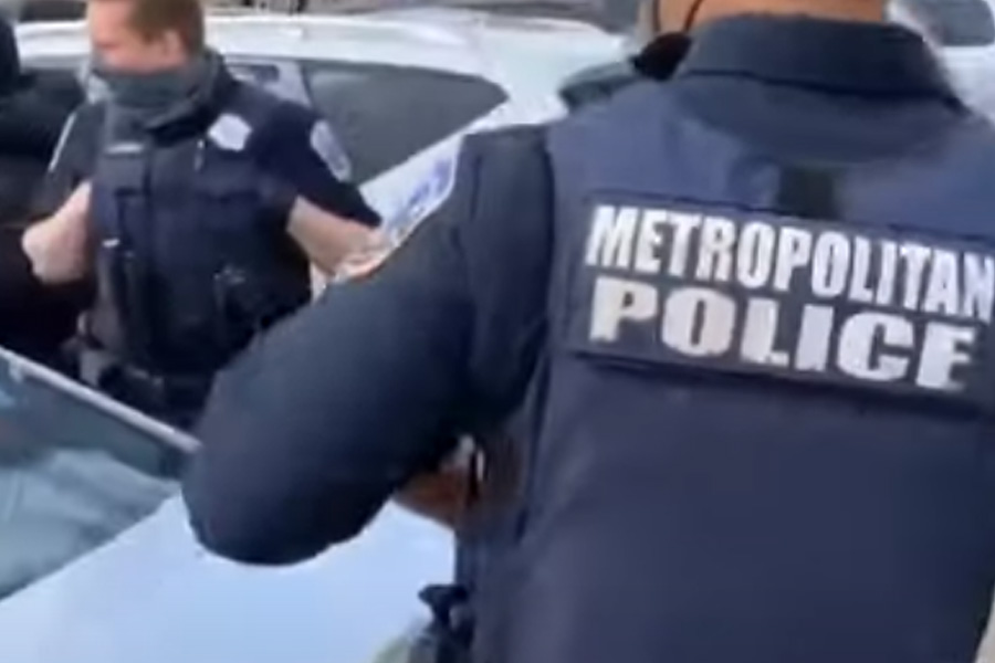 A video captured a confrontation between an unknown man and officers of the Metropolitan Police Department in Washington, DC over the death of 16-year-old Ma'Khia Bryant in Ohio last week.