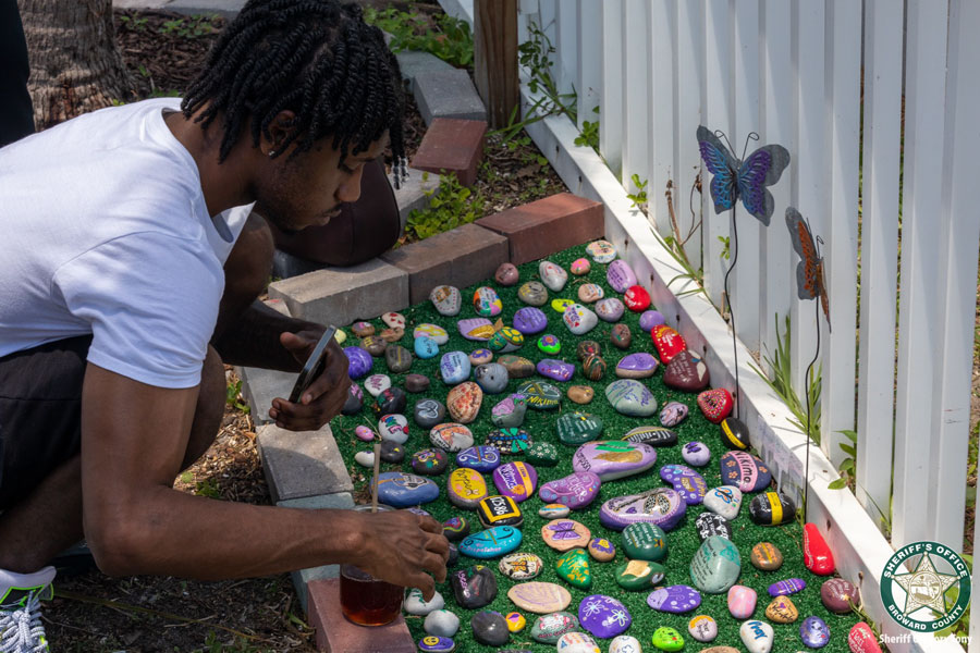 The garden is located at Lola's Market in Wilton Manors and joins a mural dedicated to Broward Sheriff’s Office Deputy Shannon Bennett and a garden of painted rocks that honors the seven Broward Sheriff’s Office employees who died from COVID-19. 