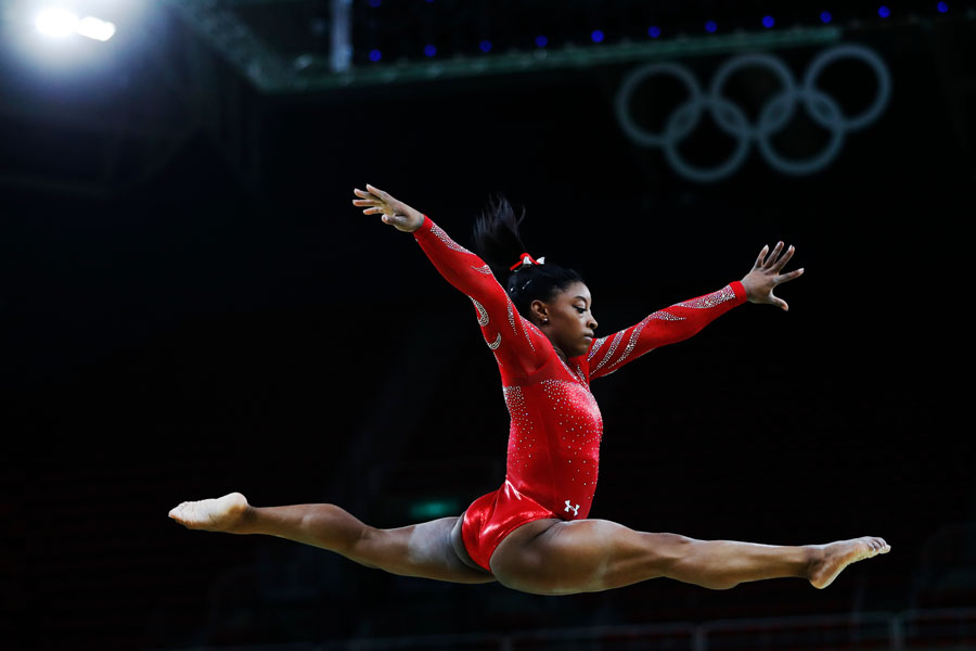 Simone Biles at the Rio 2016 Summer Olympic Games artistic gymnastics. Athlete of team USA performs a training session prior to the medal competition. File photo: Salty View, Shutterstock.com, licensed.