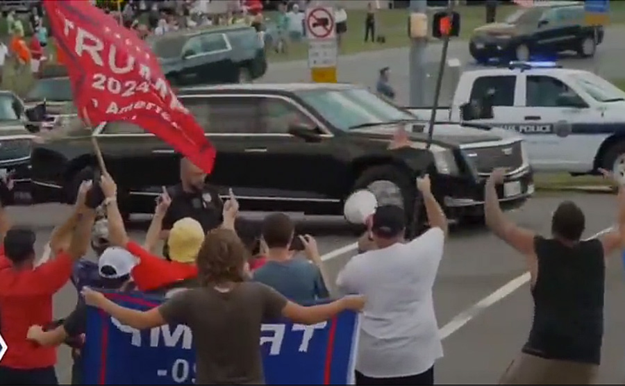  Trump supporters – some of whom question the outcome of the 2020 election – lined up on Route 100 angrily yelled insults, extended middle fingers, and waved flags emblazoned with pro-Trump and anti-Biden slogans – many of them containing obscenities – as the large motorcade passed by with a police escort. 