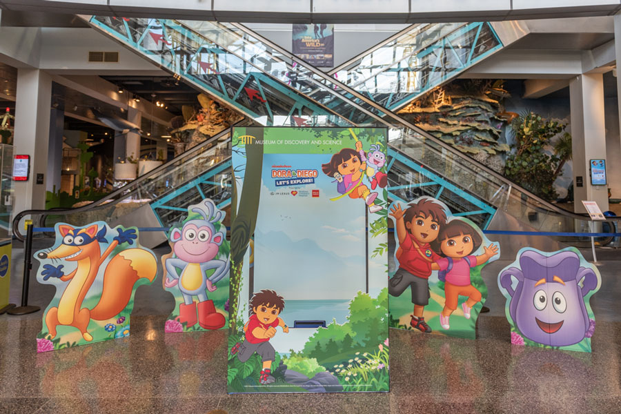 Dora & Diego – Let’s Explore! photo box and display at the Museum entrance.