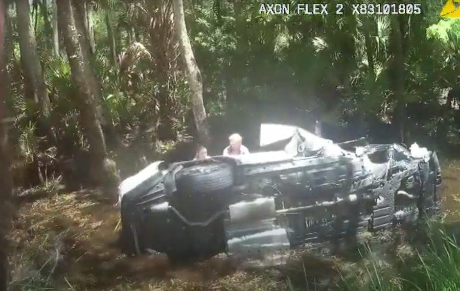 Yesterday, after an SUV veered off Maytown Road in Oak Hill and overturned in the water, deputies, witnesses and Volusia County firefighters worked together to push it upright. 