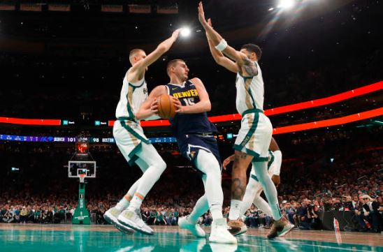 nikola-jokic-powers-nuggets-victory-celtics-115-109-triple-double-brilliance