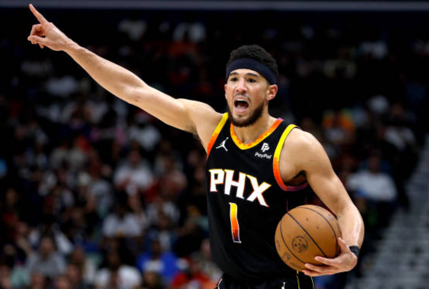 suns-shine-bright-as-devin-booker-lights-up-the-court-with-career-high-52