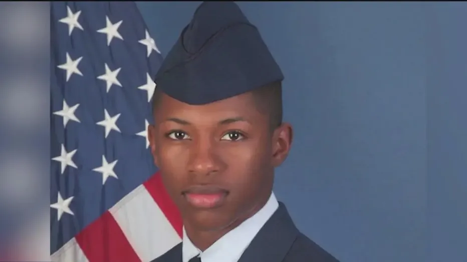 Fired deputy sued for killing US airman who answered door with gun pointed at ground